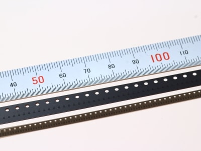 Embossed carrier tape for ultra small devices